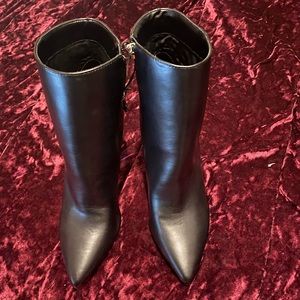 Nine W. booties with clear he’ll very nice and classy